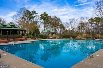 **BEST DEAL IN TOWN!!** Nestled in a serene lake community, this on The Highlands Course at Lake Arrowhead in Georgia - for sale on GolfHomes.com, golf home, golf lot