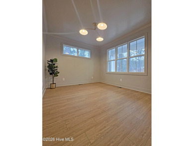 Discover refined living in this stunning new construction by on Seven Lakes Country Club in North Carolina - for sale on GolfHomes.com, golf home, golf lot