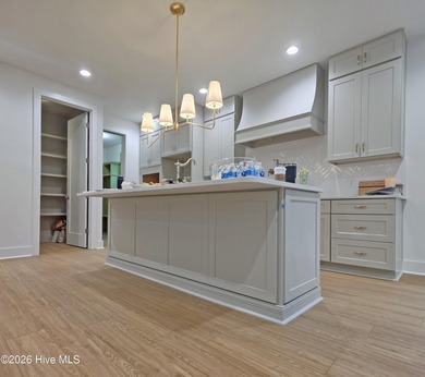 Discover refined living in this stunning new construction by on Seven Lakes Country Club in North Carolina - for sale on GolfHomes.com, golf home, golf lot