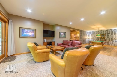 Discover the epitome of luxury at 915 Chardonnay Ln, Including on Garland Resort and Golf Club  in Michigan - for sale on GolfHomes.com, golf home, golf lot