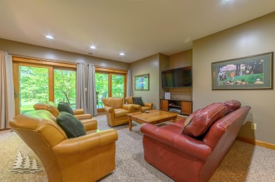 Discover the epitome of luxury at 915 Chardonnay Ln, Including on Garland Resort and Golf Club  in Michigan - for sale on GolfHomes.com, golf home, golf lot