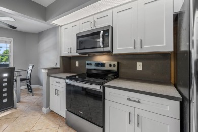This beautifully updated,  2-bedroom, 2-bathroom condo is on Wynmoor Golf Course in Florida - for sale on GolfHomes.com, golf home, golf lot
