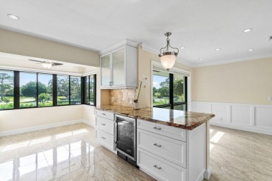 Exceptional residence with sweeping golf course views. Step into on Quail Ridge Golf Course and Country Club in Florida - for sale on GolfHomes.com, golf home, golf lot