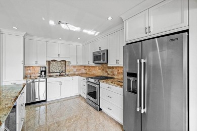 Exceptional residence with sweeping golf course views. Step into on Quail Ridge Golf Course and Country Club in Florida - for sale on GolfHomes.com, golf home, golf lot