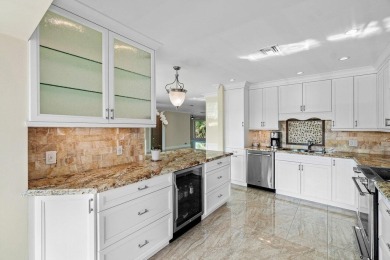 Exceptional residence with sweeping golf course views. Step into on Quail Ridge Golf Course and Country Club in Florida - for sale on GolfHomes.com, golf home, golf lot