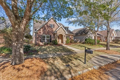 Tucked inside the Village of Highlands South, this 4-bedroom on Highland Oaks Golf Course in Alabama - for sale on GolfHomes.com, golf home, golf lot