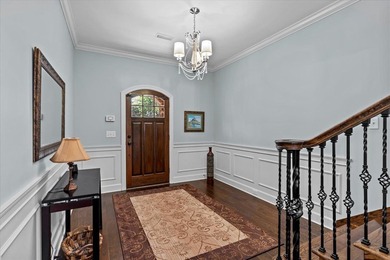 Tucked inside the Village of Highlands South, this 4-bedroom on Highland Oaks Golf Course in Alabama - for sale on GolfHomes.com, golf home, golf lot