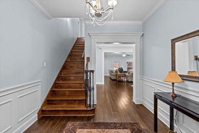 Tucked inside the Village of Highlands South, this 4-bedroom on Highland Oaks Golf Course in Alabama - for sale on GolfHomes.com, golf home, golf lot