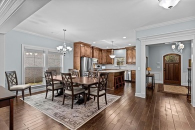 Tucked inside the Village of Highlands South, this 4-bedroom on Highland Oaks Golf Course in Alabama - for sale on GolfHomes.com, golf home, golf lot