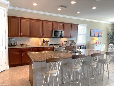 Discover one of the best views in Del Webb Naples at this on Panther Run Golf Club in Florida - for sale on GolfHomes.com, golf home, golf lot