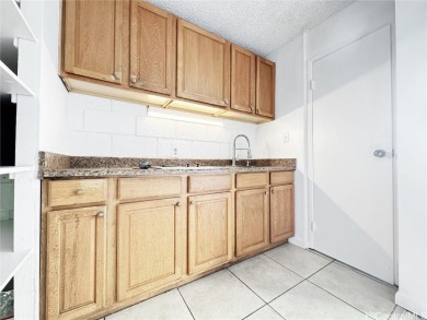 Come discover one of the least expensive FEE SIMPLE condos on Ala Wai Golf Course in Hawaii - for sale on GolfHomes.com, golf home, golf lot