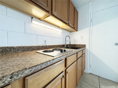 Come discover one of the least expensive FEE SIMPLE condos on Ala Wai Golf Course in Hawaii - for sale on GolfHomes.com, golf home, golf lot