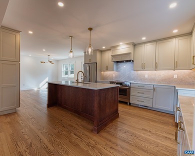 This newly remodeled 5-bedroom, 4-bath residence blends modern on Birdwood Golf Course in Virginia - for sale on GolfHomes.com, golf home, golf lot