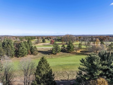 Welcome to this beautifully updated Turn-Key 2-bedroom, 2-bath on Traverse City Golf and Country Club in Michigan - for sale on GolfHomes.com, golf home, golf lot