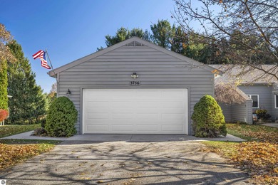 Welcome to this beautifully updated Turn-Key 2-bedroom, 2-bath on Traverse City Golf and Country Club in Michigan - for sale on GolfHomes.com, golf home, golf lot