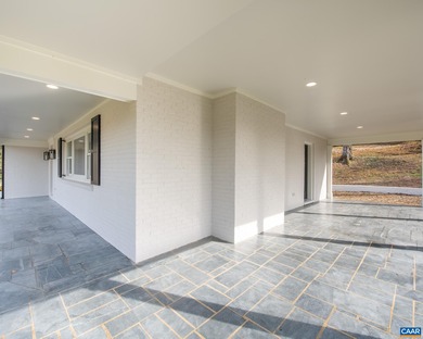 This newly remodeled 5-bedroom, 4-bath residence blends modern on Birdwood Golf Course in Virginia - for sale on GolfHomes.com, golf home, golf lot