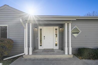 Welcome to this beautifully updated Turn-Key 2-bedroom, 2-bath on Traverse City Golf and Country Club in Michigan - for sale on GolfHomes.com, golf home, golf lot