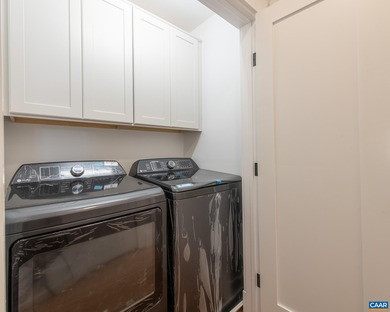 This newly remodeled 5-bedroom, 4-bath residence blends modern on Birdwood Golf Course in Virginia - for sale on GolfHomes.com, golf home, golf lot