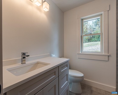 This newly remodeled 5-bedroom, 4-bath residence blends modern on Birdwood Golf Course in Virginia - for sale on GolfHomes.com, golf home, golf lot