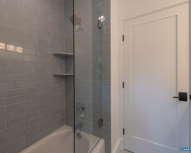 This newly remodeled 5-bedroom, 4-bath residence blends modern on Birdwood Golf Course in Virginia - for sale on GolfHomes.com, golf home, golf lot