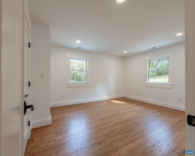 This newly remodeled 5-bedroom, 4-bath residence blends modern on Birdwood Golf Course in Virginia - for sale on GolfHomes.com, golf home, golf lot