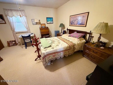 Delightful 2-bed, 1.5-bath townhouse perfect for both homeowners on Whittle Springs Golf Course in Tennessee - for sale on GolfHomes.com, golf home, golf lot