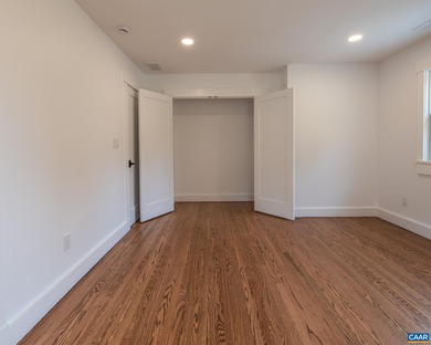 This newly remodeled 5-bedroom, 4-bath residence blends modern on Birdwood Golf Course in Virginia - for sale on GolfHomes.com, golf home, golf lot