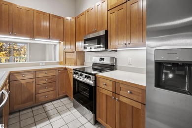 Welcome to this beautifully updated Turn-Key 2-bedroom, 2-bath on Traverse City Golf and Country Club in Michigan - for sale on GolfHomes.com, golf home, golf lot