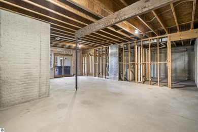 Welcome to this beautifully updated Turn-Key 2-bedroom, 2-bath on Traverse City Golf and Country Club in Michigan - for sale on GolfHomes.com, golf home, golf lot