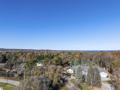 Welcome to this beautifully updated Turn-Key 2-bedroom, 2-bath on Traverse City Golf and Country Club in Michigan - for sale on GolfHomes.com, golf home, golf lot