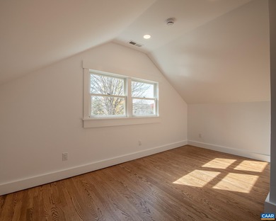 This newly remodeled 5-bedroom, 4-bath residence blends modern on Birdwood Golf Course in Virginia - for sale on GolfHomes.com, golf home, golf lot