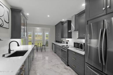 Welcome home to this fully renovated 3 bedroom, 2.5 bath home on Sawgrass Country Club  in Florida - for sale on GolfHomes.com, golf home, golf lot
