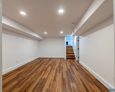 This newly remodeled 5-bedroom, 4-bath residence blends modern on Birdwood Golf Course in Virginia - for sale on GolfHomes.com, golf home, golf lot