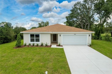 Welcome to this one-of-a-kind, newly built home in the heart of on Oak Hills Country Club in Florida - for sale on GolfHomes.com, golf home, golf lot