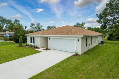 Welcome to this one-of-a-kind, newly built home in the heart of on Oak Hills Country Club in Florida - for sale on GolfHomes.com, golf home, golf lot