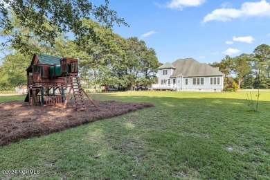 Welcome to this stunning two-story custom-built home with 2889 on Majestic Pines Golf and Country Club in North Carolina - for sale on GolfHomes.com, golf home, golf lot