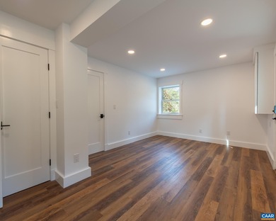 This newly remodeled 5-bedroom, 4-bath residence blends modern on Birdwood Golf Course in Virginia - for sale on GolfHomes.com, golf home, golf lot