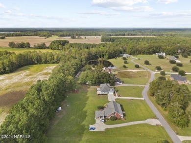 Welcome to this stunning two-story custom-built home with 2889 on Majestic Pines Golf and Country Club in North Carolina - for sale on GolfHomes.com, golf home, golf lot