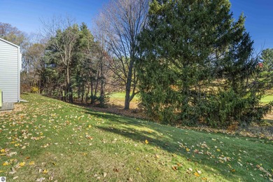 Welcome to this beautifully updated Turn-Key 2-bedroom, 2-bath on Traverse City Golf and Country Club in Michigan - for sale on GolfHomes.com, golf home, golf lot
