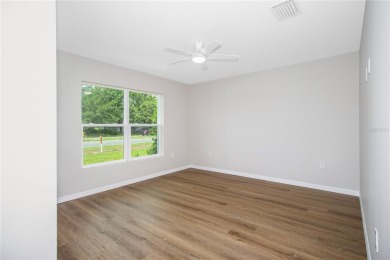 Welcome to this one-of-a-kind, newly built home in the heart of on Oak Hills Country Club in Florida - for sale on GolfHomes.com, golf home, golf lot