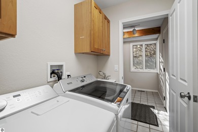 Welcome to this beautifully updated Turn-Key 2-bedroom, 2-bath on Traverse City Golf and Country Club in Michigan - for sale on GolfHomes.com, golf home, golf lot