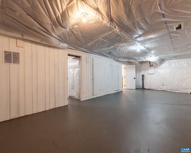 This newly remodeled 5-bedroom, 4-bath residence blends modern on Birdwood Golf Course in Virginia - for sale on GolfHomes.com, golf home, golf lot