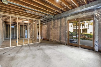 Welcome to this beautifully updated Turn-Key 2-bedroom, 2-bath on Traverse City Golf and Country Club in Michigan - for sale on GolfHomes.com, golf home, golf lot