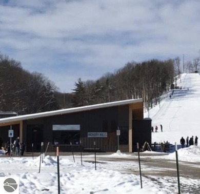 Welcome to this beautifully updated Turn-Key 2-bedroom, 2-bath on Traverse City Golf and Country Club in Michigan - for sale on GolfHomes.com, golf home, golf lot