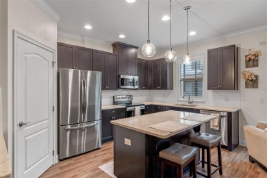 METICULOUSLY MAINTAINED 2 Bedroom, 2.5 Bath Townhome located in on Eagle Creek Golf Club in Florida - for sale on GolfHomes.com, golf home, golf lot