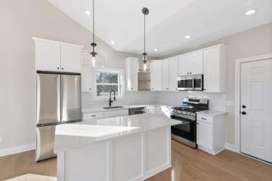 Gorgeous new construction! Welcome to Ranney Village. This on Candlestone Inn  and Golf Resort in Michigan - for sale on GolfHomes.com, golf home, golf lot