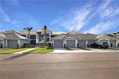 This southwest-facing GROUND FLOOR DiAngelo model, newly built on Panther Run Golf Club in Florida - for sale on GolfHomes.com, golf home, golf lot