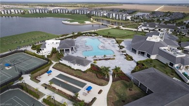 This southwest-facing GROUND FLOOR DiAngelo model, newly built on Panther Run Golf Club in Florida - for sale on GolfHomes.com, golf home, golf lot