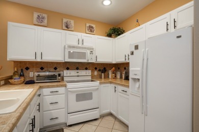 This Inviting, lakefront  2-bedroom 2-bath Villa is conveniently on South Padre Island Golf Club in Texas - for sale on GolfHomes.com, golf home, golf lot