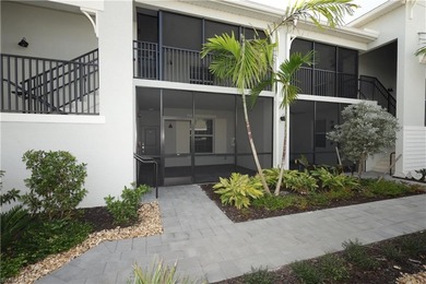 This southwest-facing GROUND FLOOR DiAngelo model, newly built on Panther Run Golf Club in Florida - for sale on GolfHomes.com, golf home, golf lot